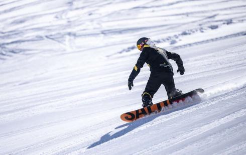 Samnaun Snowboard Kurs Lektion Unterricht Board Alptrider Sattel Schneesportschule